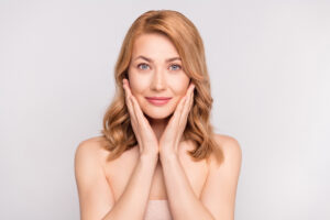 Mature woman with youthful skin from botox and dermal filler treatment