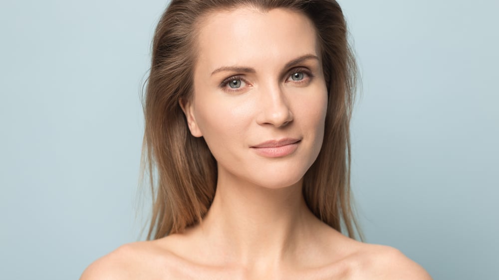 Beautiful mature woman with a youthful face after having nonsurgical cosmetic treatments.