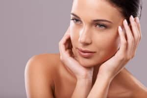 Beautiful woman with nicely refined jawline after chin augmentation